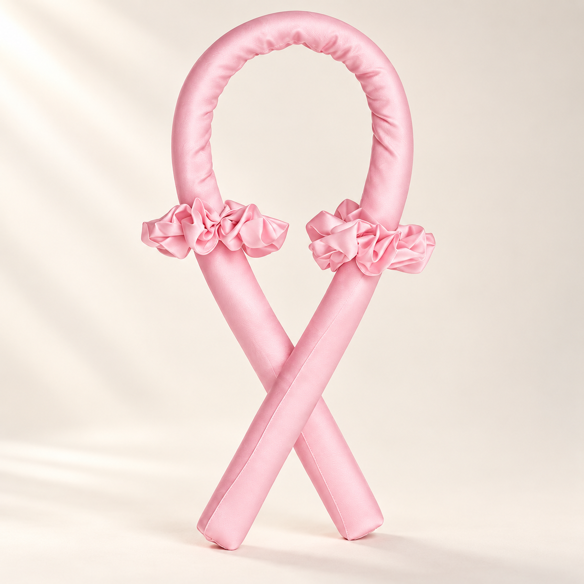 MeiLaMei: tubo rizador rosa con dos scrunchies; imagen de presentación